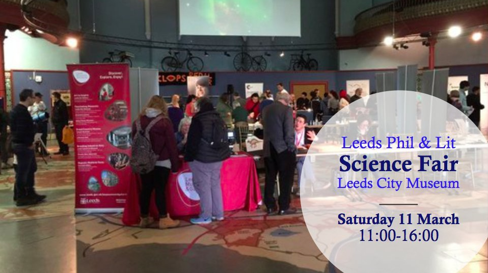 Photo of science stalls in Leeds City Museum with superimposed information that the science fair will take place from 11 to 4 on Saturday March 11th